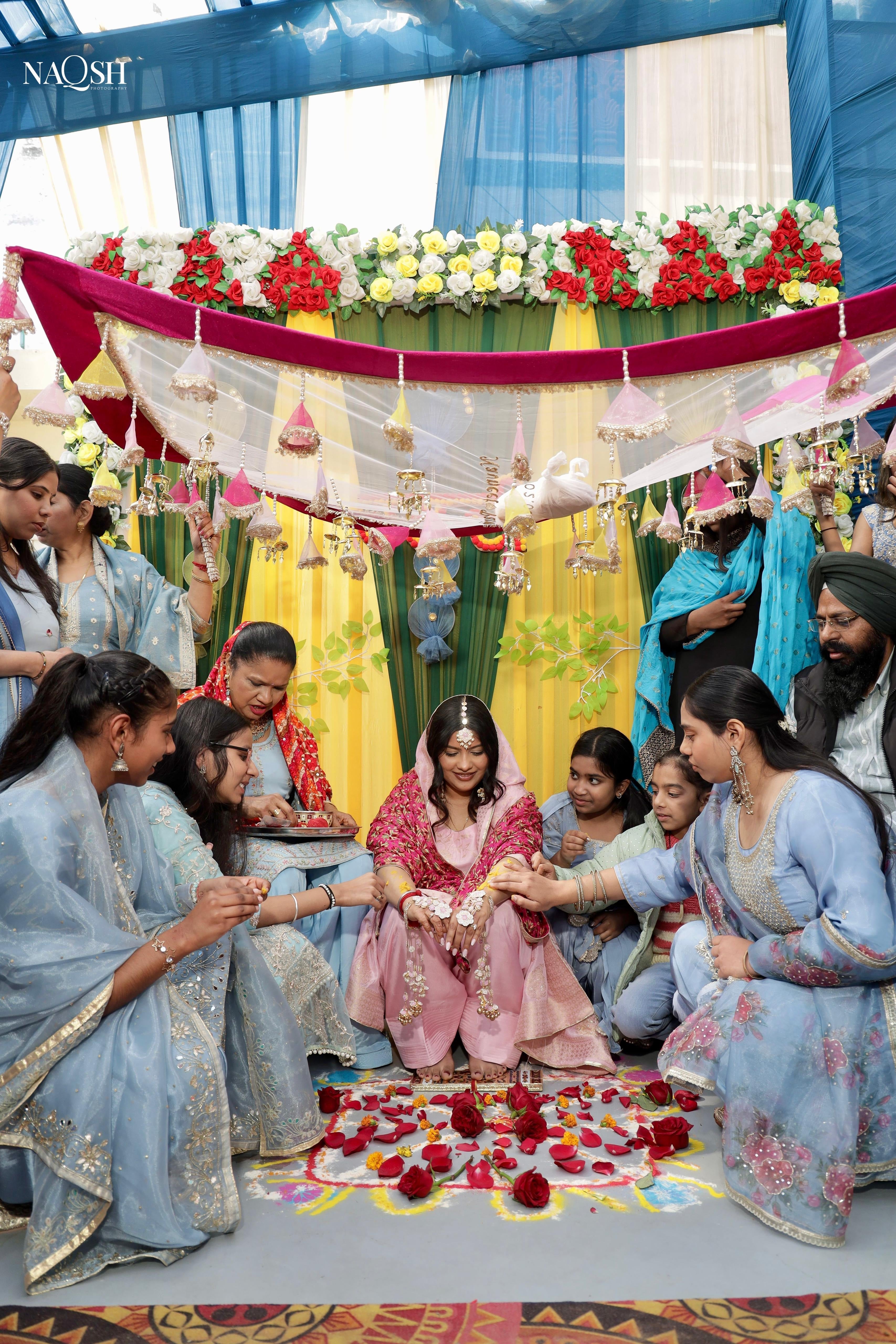 Traditional Haldi ceremony bridal entry chadar with handcrafted Indian wedding detailing and elegant decorative design