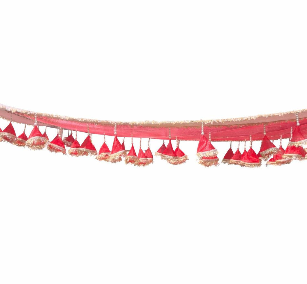 Red decorative border with tassels on a white background