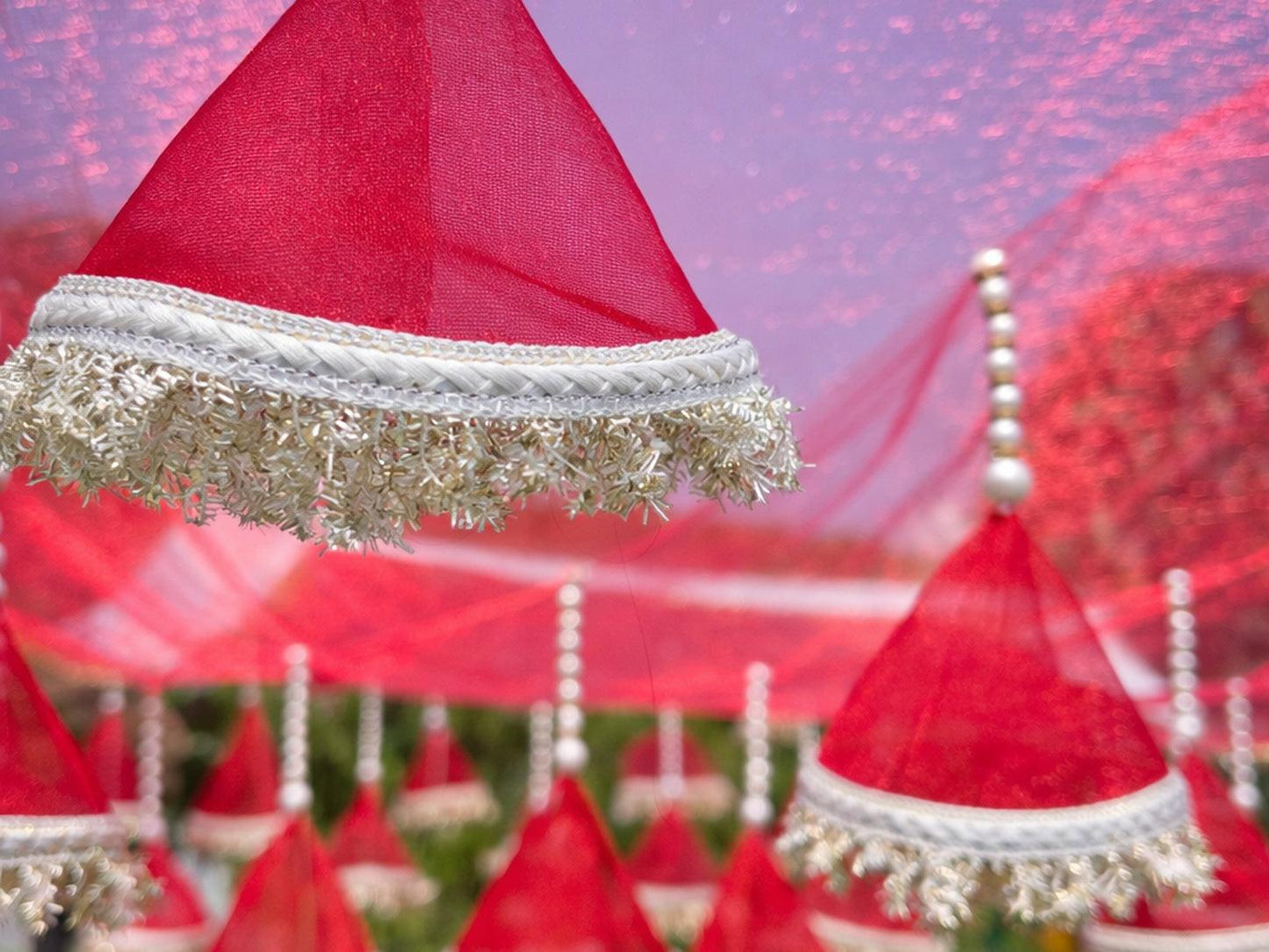 Red hats with white trim on a blurred background
