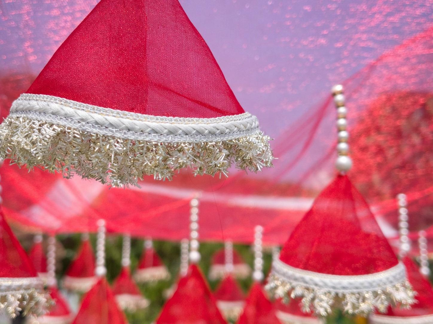 Red hats with white trim on a blurred background